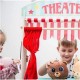 Joueco - Jucarie de lemn din lemn certificat FSC 2 in 1 Teatru si magazin Cu accesorii 110 x 68.5 x 23 cm 3 ani+ Multicolor